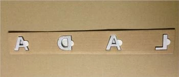 Эмблема крышки багажника L A D A (самокл. буквы с трафаретом)